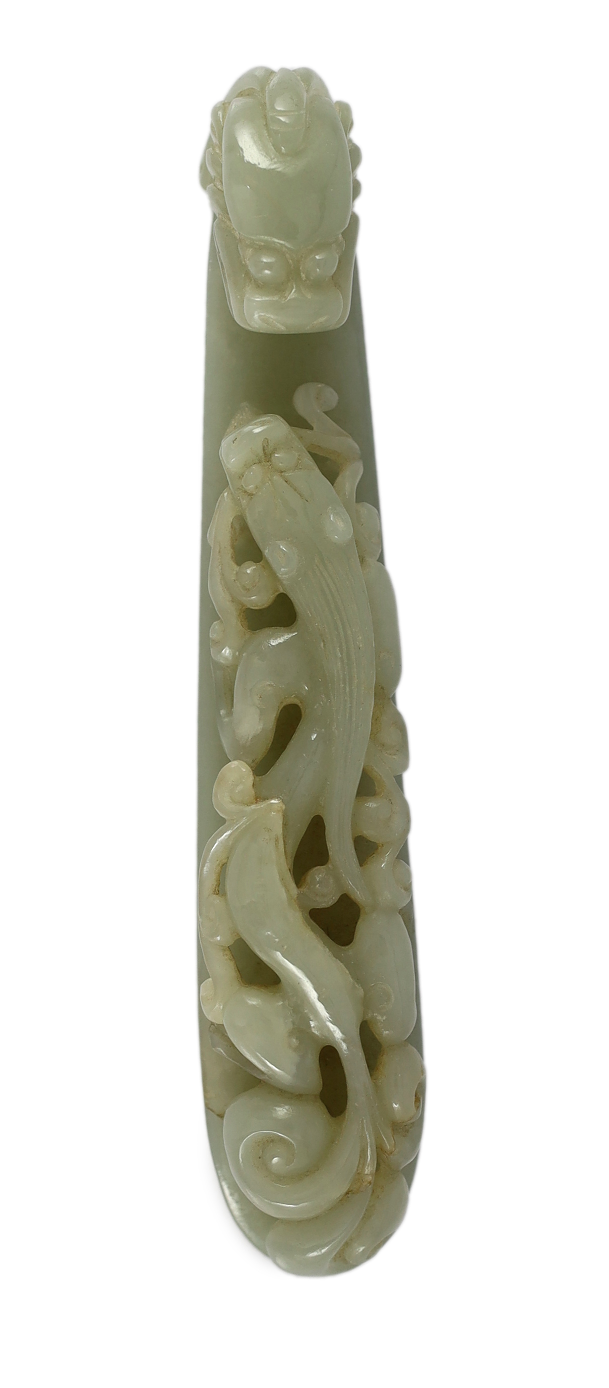 A large Chinese pale celadon jade ‘dragon’ belt hook, 18th/19th century